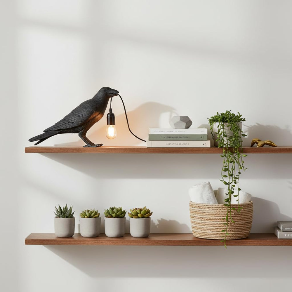 Raven crow lamp as Halloween decoration on a mantelpiece