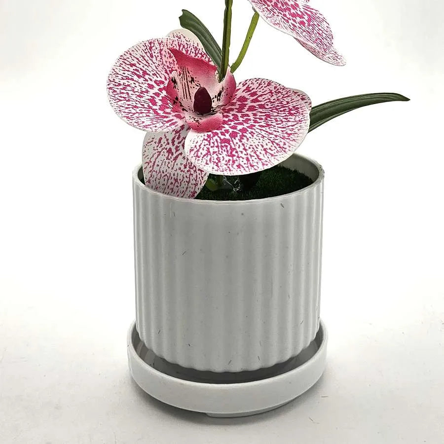 small vase with artificial flower