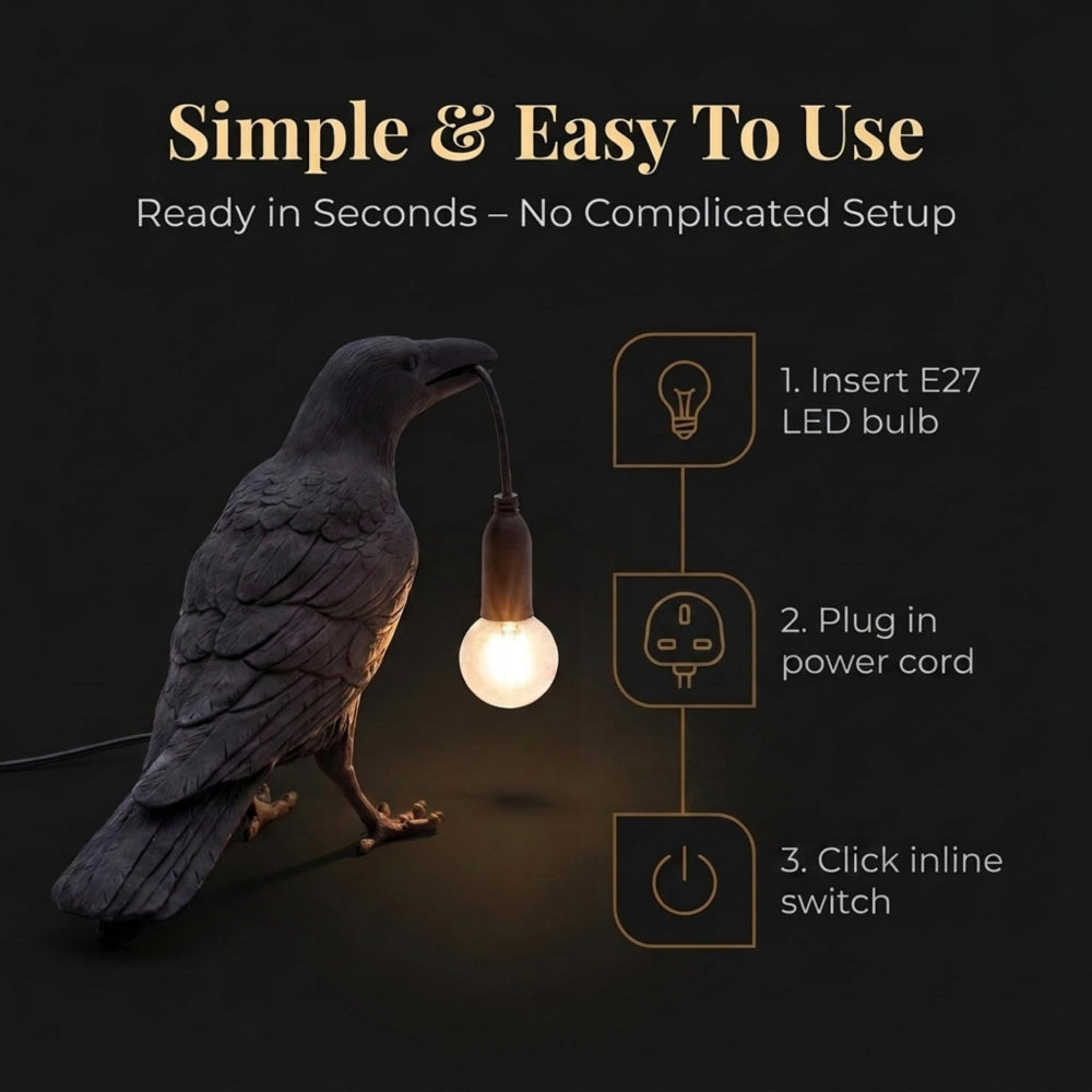 Black raven lamp switched off, showing matte resin bird sculpture