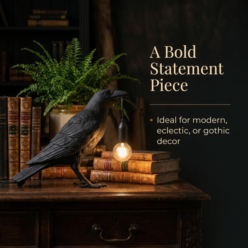 Black raven table lamp with resin crow holding a glowing E27 bulb