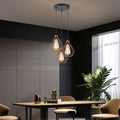 A vintage-style wire cage pendant light