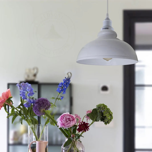 White lamp shades are a perfect way to keep a neutral colour in any space and pairs with any other colour in the room